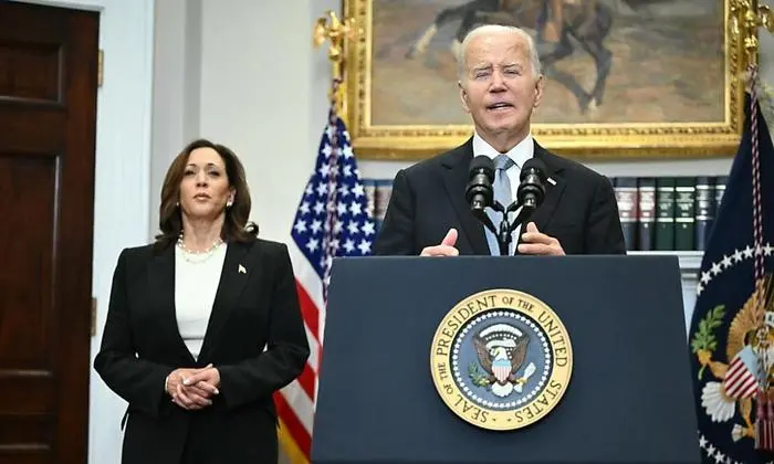 US President Joe Biden speaks from the Roosevelt Room of the White House as Vice President Kamala Harris looks on in Washington, DC, on July 14, 2024, one day after former president Donald Trump survived an apparent assassination attempt during a rally in Pennsylvania. (Photo by Mandel NGAN / AFP)