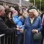 Britain's Queen Camilla meet wellwishers after departing the Scottish Parliament in Edinburgh on the occasion of the 25th Anniversary celebrations of the Scottish Parliament, Saturday, Sept. 28, 2024. (Andrew Milligan/PA via AP)