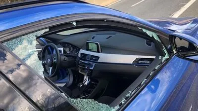 Das zerschossene Auto, wie es die drei Opfer wenige Minuten nach der Tat fotografierten