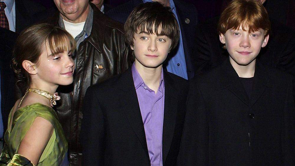 Emma Watson, Daniel Radcliffe und Rupert Grint am 11. November 2001 bei der Premiere in New York