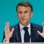 France's President Emmanuel Macron speaks during a press conference at the COP28 United Nations climate summit in Dubai on December 2, 2023. The COP28 conference opened on December 1 with an early victory as nations agreed to launch a "loss and damage" fund for vulnerable countries devastated by natural disasters. (Photo by Ludovic MARIN / AFP)