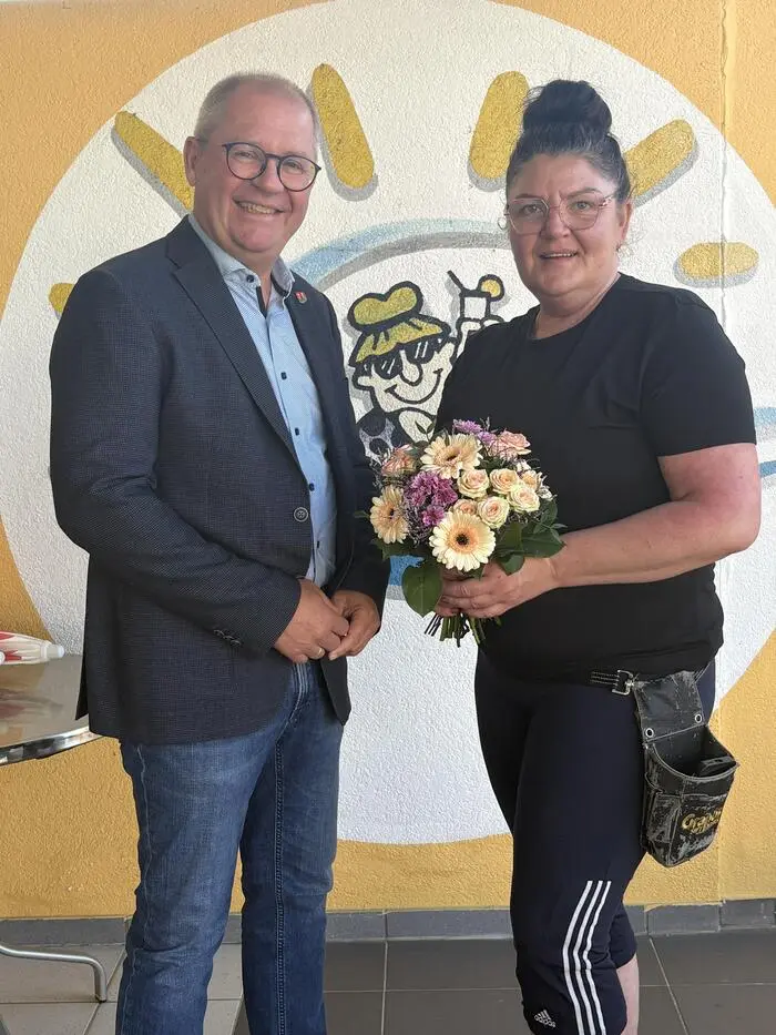 Bürgermeister Bernd Osprian und Natalija Titikalova