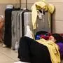 July 19, 2024, St. Petersburg, Florida, USA: Bria Beggin, 21, takes a nap while waiting as her flight home to Allentown, PA, has been cancelled due to Microsoft s global outage at the St. PeteÃâClearwater International Airport on Friday, July 19, 2024 in St. Petersburg. St. Petersburg USA - ZUMAs70_ 20240719_zan_s70_014 Copyright: xDirkxShaddx