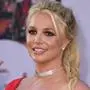 (FILES) In this file photo taken on July 22, 2019 US singer Britney Spears arrives for the premiere of Sony Pictures' "Once Upon a Time... in Hollywood" at the TCL Chinese Theatre in Hollywood, California. - Britney Spears' father is to step down as conservator of her estate, US media reported August 12, 2021, seemingly ending a bitter legal battle with his daughter. Britney, 39, last month launched a bid to remove him from the controversial guardianship role that she said amounted to "abuse." (Photo by VALERIE MACON / AFP)