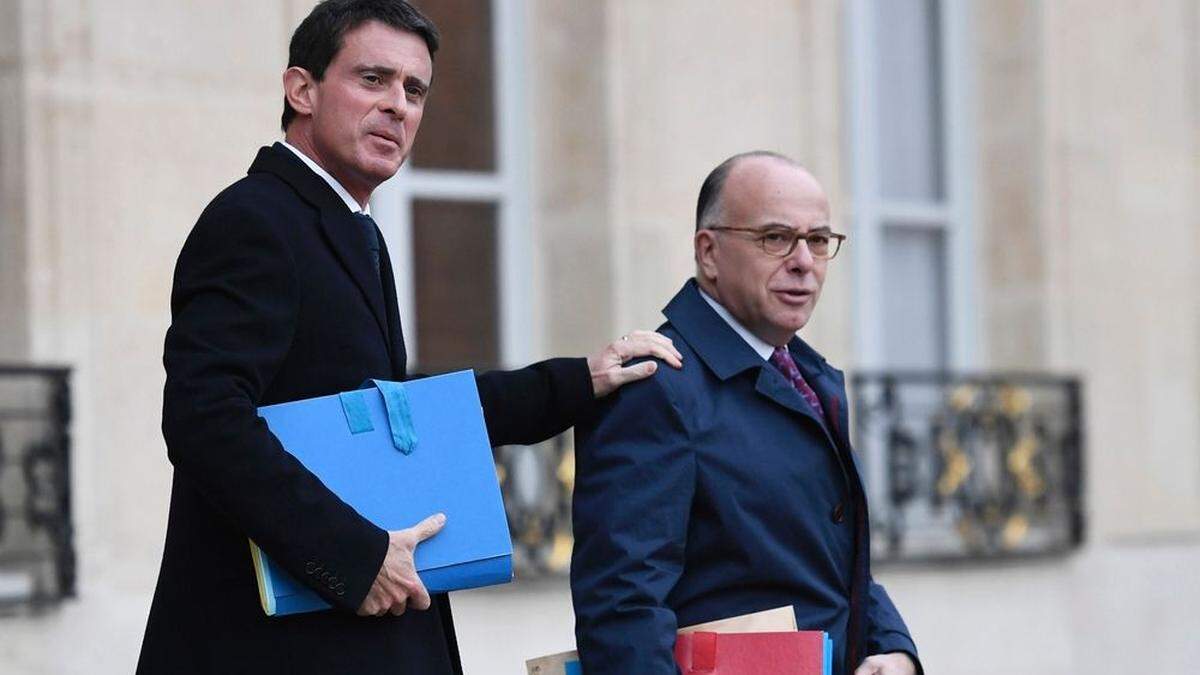 Präsidentschaftskandidat Manuel Valls und der neue Premierminister Bernard Cazeneuve nach der Amtsübergabe