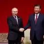 In this pool photograph distributed by the Russian state agency Sputnik, Russia's President Vladimir Putin and China's President Xi Jinping attend a concert marking the 75th anniversary of the establishment of diplomatic relations between Russia and China and opening of China-Russia Years of Culture at the National Centre for the Performing Arts in Beijing on May 16, 2024. (Photo by Alexander RYUMIN / POOL / AFP) / ** Editor's note : this image is distributed by Russian state owned agency Sputnik **