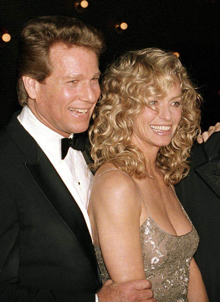 Ryan O‘Neal mit Farrah Fawcett 1989 in New York