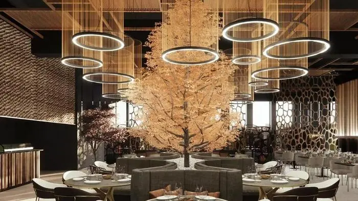 Visualisierung eines edlen Gästebereichs mit gepolsterten Bänken, einem Baum in der Mitte und hängenden Leuchten | So wurden die Pläne für das Restaurant visualisiert