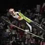 Stefan Kraft, of Austria, soars through the air during his first round jump at the Ski Jumping World Cup Men Large Hill Individual event in Zakopane, Poland, Sunday, Jan. 21, 2024. (AP Photo/Czarek Sokolowski)
