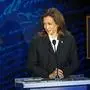 TOPSHOT - US Vice President and Democratic presidential candidate Kamala Harris listens as former US President and Republican presidential candidate Donald Trump speaks during a presidential debate at the National Constitution Center in Philadelphia, Pennsylvania, on September 10, 2024. (Photo by SAUL LOEB / AFP)