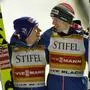 Stefan Kraft, left, and Michael Hayboeck, right, of Austria, celebrate after their victory in the men's large hill super team World Cup ski jumping competition Saturday, Feb. 10, 2024, in Lake Placid, N.Y. (AP Photo/Robert F. Bukaty)
