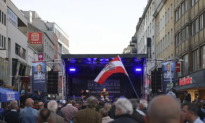 Presidential Candidate of the FPO (Freiheitliche Partei Österreich) Walter Rosenkranz addresses his supporters during the election rally in Vienna, Austria, Friday, Oct. 7, 2022. (AP Photo/Theresa Wey)