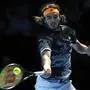 Greece's Stefanos Tsitsipas returns against Germany's Alexander Zverev during their men's singles round-robin match on day four of the ATP World Tour Finals tennis tournament at the O2 Arena in London on November 13, 2019. (Photo by Adrian DENNIS / AFP)
