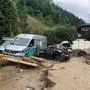 Strussnig-Fahrzeuge wurden von den Wassermassen mitgerissen