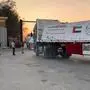 This frame grab taken from an AFPTV footage shows an aid truck on the Egyptian side of the Rafah crossing with the Gaza Strip, driving toward the besieged Palestinians territory on July 27, 2025. Egyptian state-linked media on July 27 reported that aid trucks had begun entering the Gaza Strip as Israel announced a "tactical pause" in parts of the devastated territory to allow deliveries. (Photo by AFPTV STRINGER / AFP)