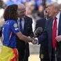 President Donald Trump, right, greets Chelsea's Marc Cucurella during the trophy ceremony after the Club World Cup final soccer match between Paris Saint-Germain and Chelsea in East Rutherford, N.J., Sunday, July 13, 2025. (AP Photo/Frank Franklin II)
