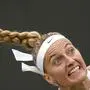 Czech Republic's Petra Kvitova serves to Serbia's Natalija Stevanovic in a women's singles match on day six of the Wimbledon tennis championships in London, Saturday, July 8, 2023. (AP Photo/Kirsty Wigglesworth)