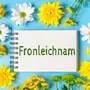Germany - May 26, 2025: PHOTOMONTAGE, A notepad with the inscription: Corpus Christi, lies on a blue background and is framed by yellow, white and green flowers *** FOTOMONTAGE, Ein Notizblock mit der Aufschrift: Fronleichnam, liegt auf blauem Hintergrund und ist von gelben, weißen und grünen Blumen eingerahmt