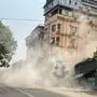 This photo shows a building collapsing in Mandalay on March 28, 2025, during an earthquake. A powerful earthquake killed more than 20 people across Myanmar and Thailand on March 28, toppling buildings and bridges and trapping over 80 workers in an under-construction skyscraper in Bangkok. (Photo by AFP)