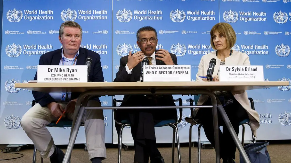 Tedros Adhanom Ghebreyesus, Director General of the World Health Organization (WHO), center, is flanked by Michael Ryan, left, Executive Director of WHO's Health Emergencies program, left,  and Sylvie Briand, right, Director of Global Infectious Hazard Preparedness of WHO, during a press conference at the World Health Organization headquarters in Geneva, Switzerland, Wednesday, February 5, 2020. WHO Director-General Tedros Adhanom Ghebreyesus urged countries outside China to share more data on infections, saying detailed information has been provided in only 38% of cases. (Salvatore Di Nolfi/Keystone via AP)