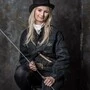 Eine junge Frau in Rauchfangkehrer- Bekleidung lächelt in die Kamera  | Silvia Novak ist bereits in der vierten Generation als Rauchfangkehrerin unterwegs