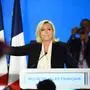 (FILES) French far-right party Rassemblement National (RN) presidential candidate Marine Le Pen reatcs after her speech at the Pavillon d'Armenonville in Paris on April 24, 2022 after the announcement of the first projections by polling firms of the French presidential election's second round results. The presidential campaign of Marine Le Pen (RN) in 2022 is the subject of an investigation into suspicions of illegal financing following a report from the National Commission for Campaign Accounts and Political Financing (CNCCFP), the Paris prosecutor's office said on Tuesday, confirming information from BFMTV. (Photo by Christophe ARCHAMBAULT / AFP)