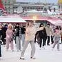 TOPSHOT - People skate at an outdoor ice skating rink in Red Square in downtown Moscow on December 1, 2023. (Photo by Natalia KOLESNIKOVA / AFP)