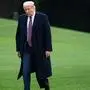 TOPSHOT - US President Donald Trump walks from Marine One after arriving on the South Lawn of the White House in Washington, DC, October 1, 2020, following campaign events in New Jersey. - White House Chief of Staff Mark Meadows said on October 1, 2020, that he was optimistic about a rapid recovery for the president as he confirmed that Trump has "mild symptoms" after testing positive for Covid-19. "The president and the First Lady... remain in good spirits," Meadows told reporters. (Photo by SAUL LOEB / AFP)