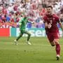Serbia's Luka Jovic celebrates after scoring his side first goal during a Group C match between Slovenia and Serbia at the Euro 2024 soccer tournament in Munich, Germany, Thursday, June 20, 2024. (AP Photo/Matthias Schrader)