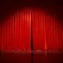 A 3D-rendered typical closed stage curtain creates an entertainment background *** einer 3D gerendert typische geschlossen B
