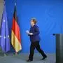 German Chancellor Angela Merkel leaves after addressing a press conference following a metting with international economic and Financial organisations at the Chancellery in Berlin, Germany, on May 20, 2020 on the effects of the novel coronavirus COVID-19 pandemic. (Photo by Odd ANDERSEN / various sources / AFP)