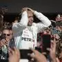 Lewis Hamilton of Great Britain driving the (44) Mercedes AMG Petronas F1 Team reacts after being crowned World Champion during his second place finish at the F1 Grand Prix of USA at Circuit of The Americas in Austin, Texas on November 3, 2019. - Lewis Hamilton claimed his sixth drivers world championship title on Sunday when he finished second at the United States Grand Prix. (Photo by Mark RALSTON / AFP)