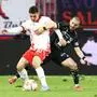 SALZBURG,AUSTRIA,23.APR.25 - SOCCER - ADMIRAL Bundesliga, championship group, Red Bull Salzburg vs Wolfsberger AC. Image shows Oscar Gloukh (RBS) and Sandro Altunashvili (WAC).
Photo: GEPA pictures/ Mathias Mandl