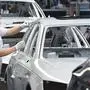 (FILES) In this file photo taken on March 14, 2018 an employee of the German car maker Audi is pictured at the production line in Ingolstadt, southern Germany. - Industrial production in Germany fell by 9.2 percent month-on-month in March, official data showed on May 7, 2020, as Europe's top economy began to feel the effects of the coronavirus crisis. The vital car industry with its 800,000 employees was among the most heavily impacted, suffering a 31.1 percent drop in production. (Photo by CHRISTOF STACHE / AFP)