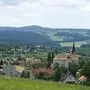 steiermark, weststeiermark, köflach, ort, stadt, stadtgemeinde, gemeinde, zentrum, kirche, kirchturm, st. magdalena pfarrkirche, häuser, gebäude, landschaft, panorama, panoramablick, ausblick, grünfläche,