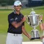 Aaron Rai mit seiner Frau Gaurika Bishnoi und der Wanamaker Trophy 