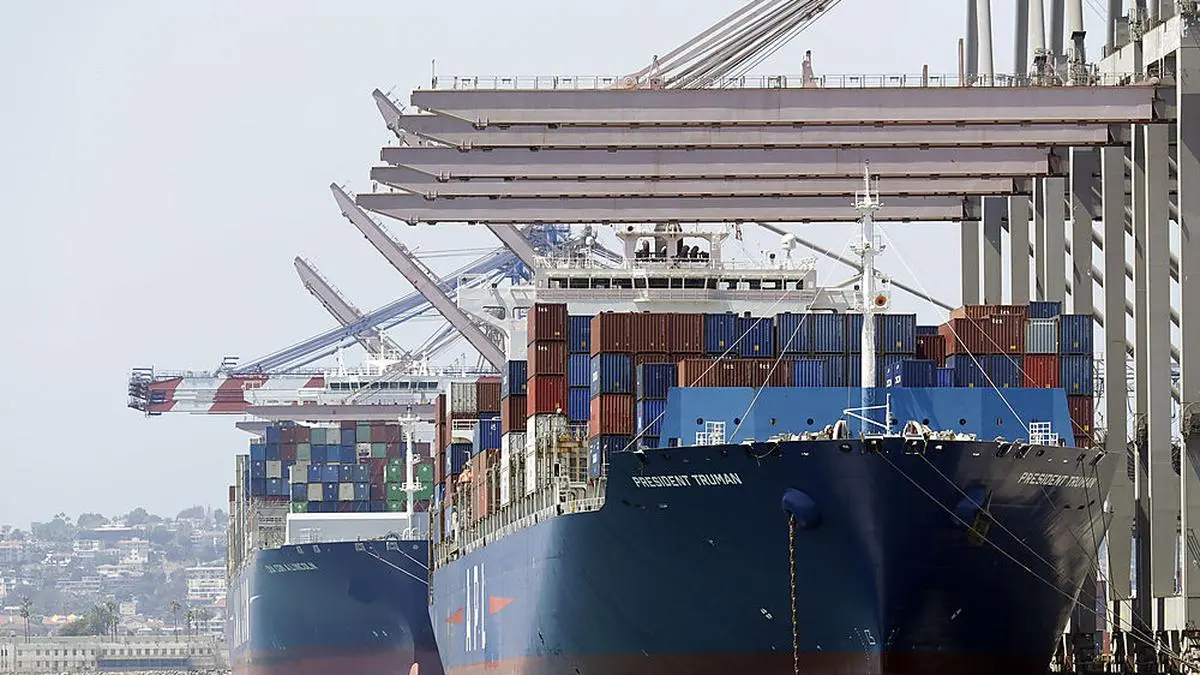 ADVANCE FOR USE FRIDAY, AUG. 31, 2018, AT 3:01 A.M. EDT AND THEREAFTER - In this Wednesday, Aug. 22, 2018, photo ships are docked at the Port of Long Beach in Long Beach, Calif. Between them, the California ports of Los Angeles and Long Beach account for a large amount of the seaborne goods that the United States imports from China, and the prospect of a widening trade war between the global giants has port executives and longshoremen worried. (AP Photo/Marcio Jose Sanchez)