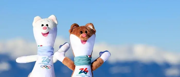 Milo und Tina sind die beiden Maskottchen der Olympischen Winterspiele in Mailand Cortina