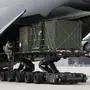 US Air Force airmen load cargo of the 10th Army Air and Missile Defense Command for deploying to Turkey at the  US Air Base in Ramstein, Germany, Tuesday, Jan. 8, 2013 as part of efforts meant to protect the NATO (North Atlantic Treaty Organization) ally from potential Syrian warheads. The US, Germany and the Netherlands are each deploying two batteries of the US-built defense system to boost Turkey's air defenses against any spillover from Syria's nearly two-year civil war. (AP Photo/Frank Augstein)