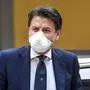 Maske und Frisur sitzen bei Giuseppe Conte