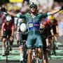 Lidl - Trek team's Italian rider Jonathan Milan wearing the best sprinter's green jersey cycles to the finish line to win the 8th stage of the 112th edition of the Tour de France cycling race, 171.4 km between Saint-Meen-le-Grand and Laval Espace Mayenne, western France, on July 12, 2025. (Photo by Marco BERTORELLO / AFP)
