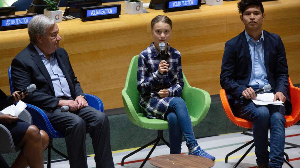 Greta Thunberg (Mitte), UN-Generalsekretär Antonio Guterres (l.)