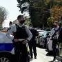 French police officials block off a street near a police station in Rambouillet, south-west of Paris, on April 23, 2021, after a woman was stabbed to death. - A woman was stabbed to death at police station in Rambouillet near Paris after an attack by a Tunisian man who was shot dead according to police sources. (Photo by Bertrand GUAY / AFP)