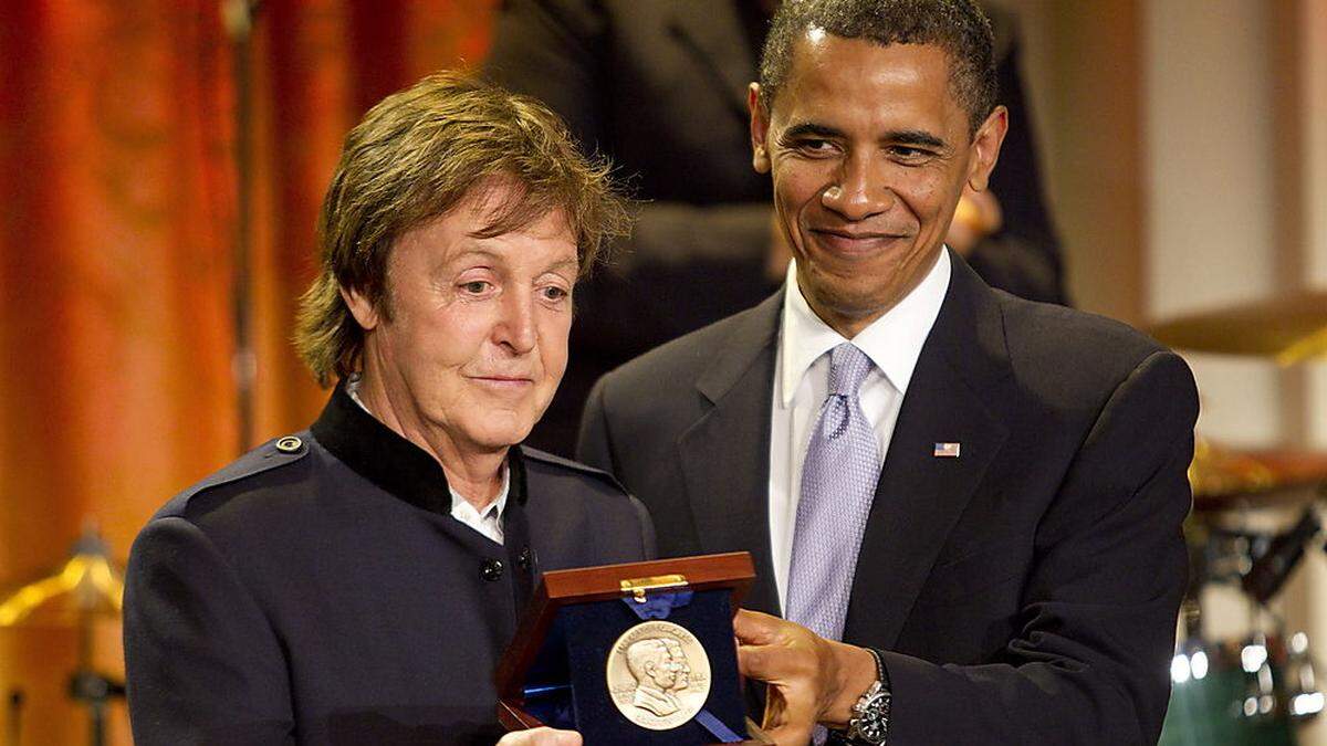 Barack Obama und Paul McCartney. Auch ein Song der Beatles ist auf der Hitliste des Präsidenten.