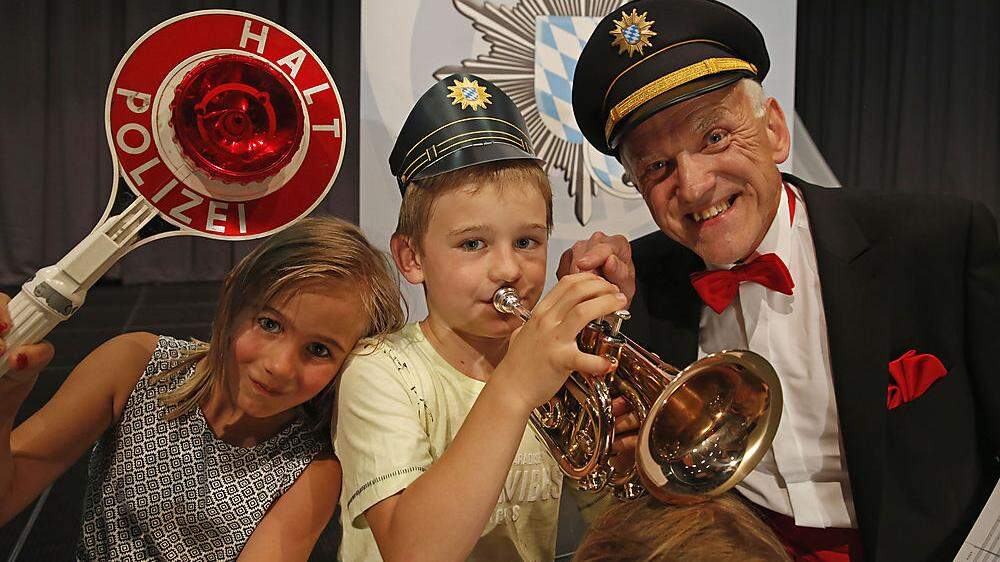 Hans Mösenbichler und das Polizeiorchester Bayern laden Kinder zum Konzert