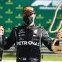 Mercedes' Finnish driver Valtteri Bottas celebrates with the trophy on the podium after the Austrian Formula One Grand Prix race on July 5, 2020 in Spielberg, Austria. (Photo by Mark Thompson / POOL / AFP)