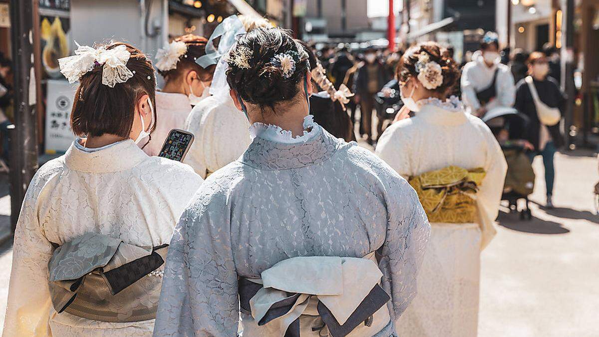In China nicht gern gesehen – besonders nicht an historischen Denkmälern. Das japanische Kimono-Gewand
