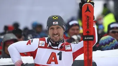 Austria's Marcel Hirscher waits at the finish area during an alpine ski, men's World Cup slalom, in Kitzbuehel, Austria, Saturday Jan. 26, 2019. (AP Photo/Alessandro Trovati)