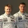 McLaren Mercedes Formula 1 team drivers Britain's David Coulthard, right, and Finn  Kimi Raikkonen, left, stand next to the new MP4-17 McLaren during the official  McLaren presentation  at Barcelona's Montmelo racetrack Saturday Jan. 19 2002. The F1 season starts in Melbourne in Australia on March 3. 
(AP Photo/Cesar Rangel)

 