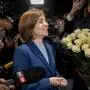 Moldova's President Maia Sandu celebrates with supporters as preliminary results are announced for the presidential election runoff in Chisinau, Moldova, Sunday, Nov. 3, 2024. (AP Photo/Vadim Ghirda)
